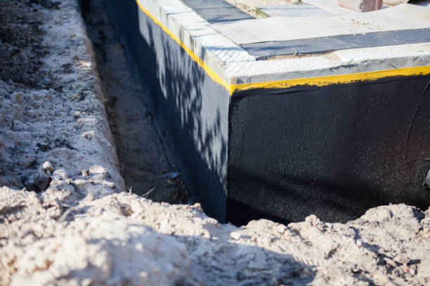 Professional Exterior Waterproofing technician working in Napoleon, IN